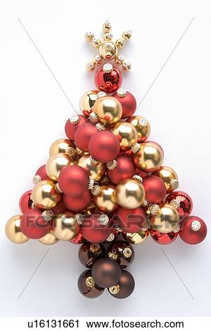 Christmas Tree Made From Baubles Against White Background View Large Photo Image Stock Image - Christmas Tree Made From Baubles Against White Background. Fotosearch