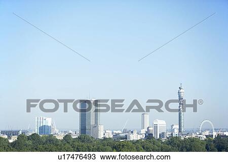 Cityscape With The BT Tower And Millennium Wheel, London, England View Large Photo Image Stock Image - Cityscape With The BT Tower And Millennium Wheel, London, England. Fotosearch