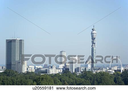 Stock Image - Cityscape With The BT Tower And Millennium Wheel, London, England. Fotosearch