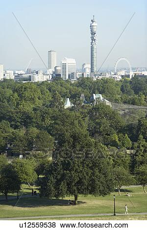 Cityscape With The BT Tower And Millennium Wheel, London, England View Large Photo Image Stock Photo - Cityscape With The BT Tower And Millennium Wheel, London, England. Fotosearch