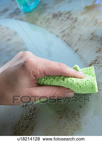 Cleaning Grease And Dirt Off Glass Counter View Large Photo Image Stock Photo - Cleaning Grease And Dirt Off Glass Counter. Fotosearch