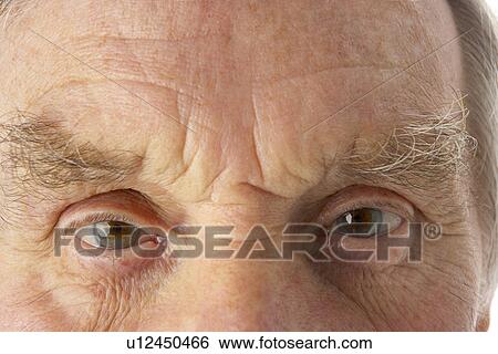 Close-up of senior man View Large Photo Image Stock Photograph - Close-up of senior man. Fotosearch