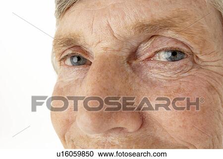Stock Image - Close-up of senior woman. Fotosearch