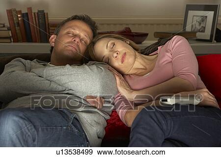 Couple Asleep In Front Of Television View Large Photo Image Stock Photo - Couple Asleep In Front Of Television. Fotosearch