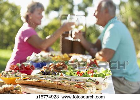 Couple Dining Al Fresco, Toasting Each Other View Large Photo Image Stock Image - Couple Dining Al Fresco, Toasting Each Other. Fotosearch