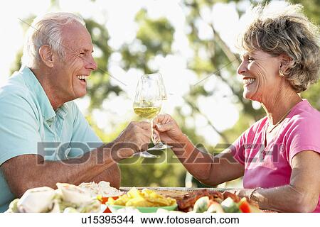 Couple Eating An Al Fresco Meal View Large Photo Image Picture - Couple Eating An Al Fresco Meal. Fotosearch