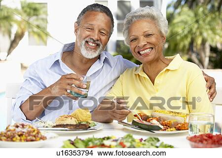 Couple Eating An Al Fresco Meal View Large Photo Image Picture - Couple Eating An Al Fresco Meal. Fotosearch