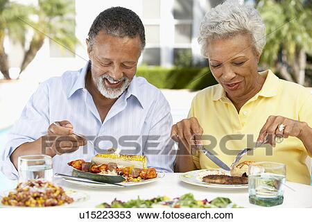 Couple Eating An Al Fresco Meal View Large Photo Image Stock Image - Couple Eating An Al Fresco Meal. Fotosearch