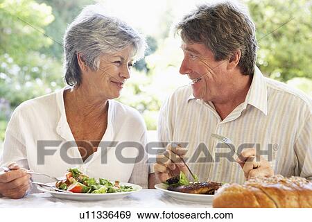 Couple Eating An Al Fresco Meal View Large Photo Image Stock Photo - Couple Eating An Al Fresco Meal. Fotosearch