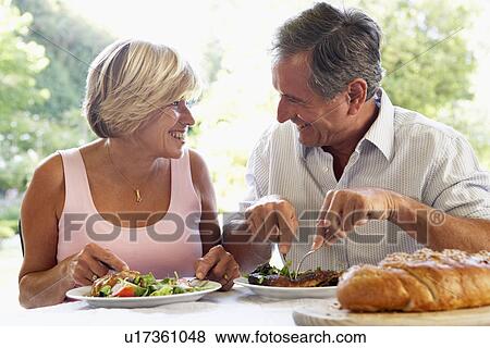 Couple Eating An Al Fresco Meal View Large Photo Image Stock Photo - Couple Eating An Al Fresco Meal. Fotosearch