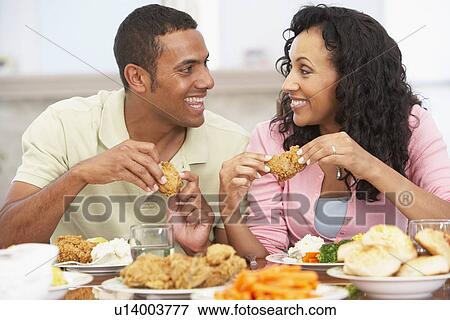 Stock Photo - Couple Having Lunch Together At Home. Fotosearch