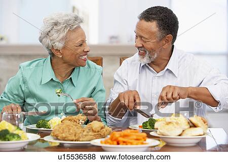 Couple Having Lunch Together At Home View Large Photo Image Stock Photo - Couple Having Lunch Together At Home. Fotosearch
