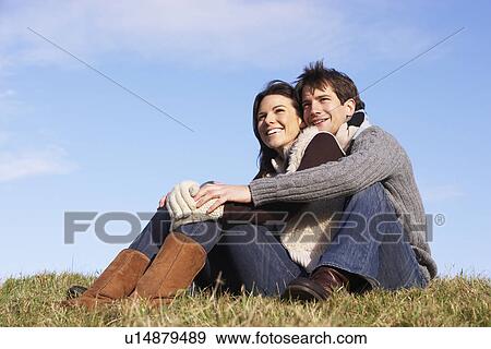 Couple Sitting In Park Together View Large Photo Image Stock Photo - Couple Sitting In Park Together. Fotosearch