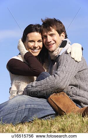 Couple Sitting In Park Together View Large Photo Image Stock Photograph - Couple Sitting In Park Together. Fotosearch
