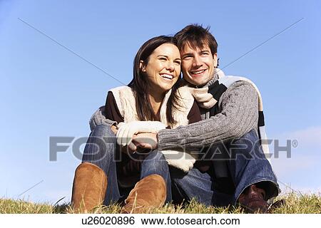 Couple Sitting In Park Together View Large Photo Image Stock Photograph - Couple Sitting In Park Together. Fotosearch