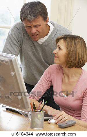 Couple Using Computer View Large Photo Image Picture - Couple Using Computer. Fotosearch