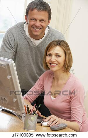Couple Using Computer View Large Photo Image Stock Photography - Couple Using Computer. Fotosearch