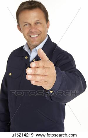 Courier Extending His Hand For A Handshake, Smiling At The Camera View Large Photo Image Stock Photo - Courier Extending His Hand For A Handshake, Smiling At The Camera. Fotosearch