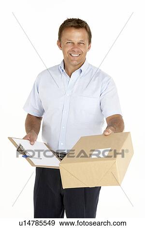 Stock Photo - Courier Holding A Parcel And Clipboard. Fotosearch