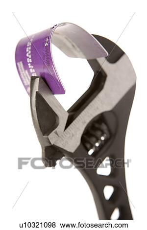 Credit Card Held In Wrench Against White Background View Large Photo Image Stock Photo - Credit Card Held In Wrench Against White Background. Fotosearch