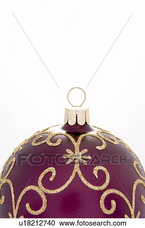 Stock Image - Detail Of Christmas Tree Bauble Against White Background. Fotosearch