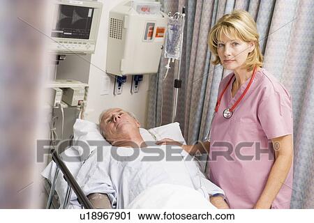 Doctor Caring For Patient View Large Photo Image Stock Image - Doctor Caring For Patient. Fotosearch