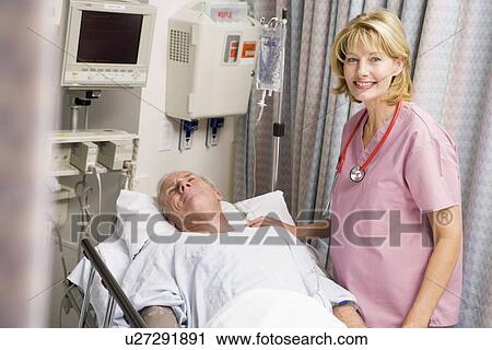 Doctor Caring For Patient View Large Photo Image Stock Image - Doctor Caring For Patient. Fotosearch