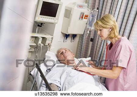 Doctor Checking Patient's Heartbeat View Large Photo Image Stock Photo - Doctor Checking Patient's Heartbeat. Fotosearch
