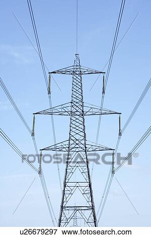Stock Photo - Electricity Pylons Against A Blue Sky. Fotosearch