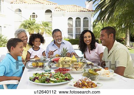 Family Eating An Al Fresco Meal View Large Photo Image Stock Image - Family Eating An Al Fresco Meal. Fotosearch