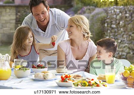 Family Eating An Al Fresco Meal View Large Photo Image Stock Image - Family Eating An Al Fresco Meal. Fotosearch