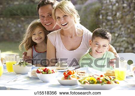 Family Eating An Al Fresco Meal View Large Photo Image Stock Photograph - Family Eating An Al Fresco Meal. Fotosearch