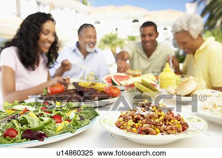 Family Eating An Al Fresco Meal View Large Photo Image Stock Photography - Family Eating An Al Fresco Meal. Fotosearch