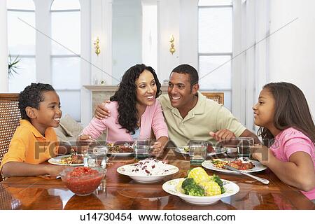 Family Having A Meal Together At Home View Large Photo Image Picture - Family Having A Meal Together At Home. Fotosearch