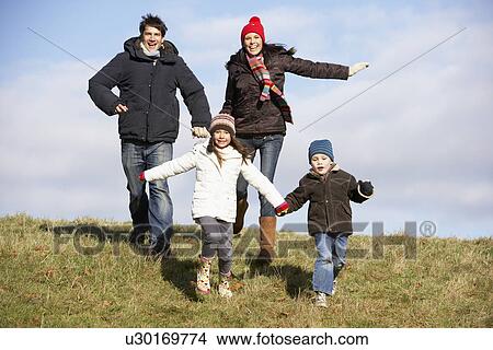 Family Running In The Park View Large Photo Image Picture - Family Running In The Park. Fotosearch