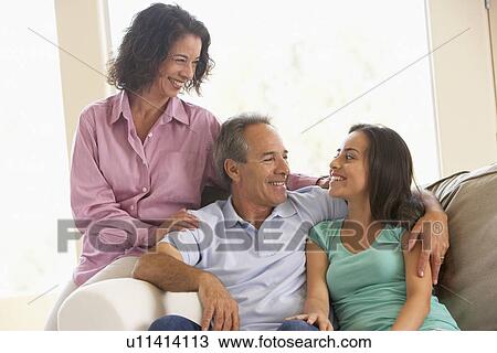 Stock Image - Family Together At Home. Fotosearch