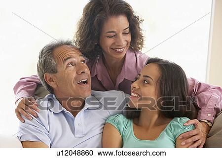 Stock Image - Family Together At Home. Fotosearch