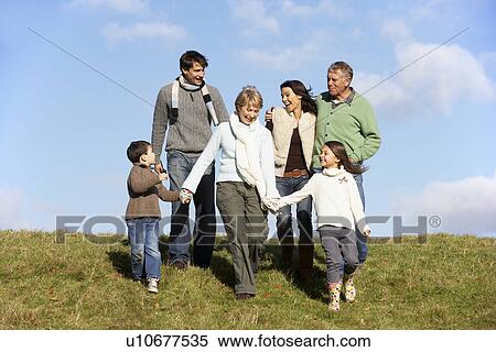 Family Walking In The Park View Large Photo Image Stock Photography - Family Walking In The Park. Fotosearch