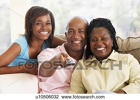 Family Watching Television Together View Large Photo Image Stock Image - Family Watching Television Together. Fotosearch