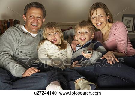 Stock Image - Family Watching Television Together. Fotosearch