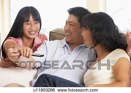 Family Watching Television Together View Large Photo Image Stock Photograph - Family Watching Television Together. Fotosearch