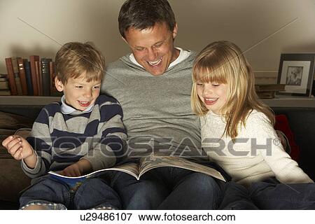 Father And Two Children Reading View Large Photo Image Stock Photo - Father And Two Children Reading. Fotosearch