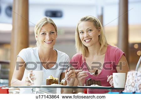 Female Friends Having Lunch Together At The Mall View Large Photo Image Picture - Female Friends Having Lunch Together At The Mall. Fotosearch