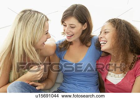 Female Friends Laughing Together View Large Photo Image Picture - Female Friends Laughing Together. Fotosearch