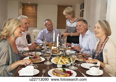 Friends At A Dinner Party View Large Photo Image Stock Image - Friends At A Dinner Party. Fotosearch