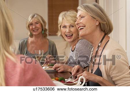 Stock Photograph - Friends At A Dinner Party. Fotosearch