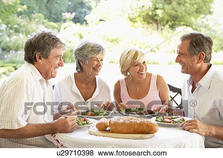 Friends Eating An Al Fresco Lunch View Large Photo Image Stock Photo - Friends Eating An Al Fresco Lunch. Fotosearch