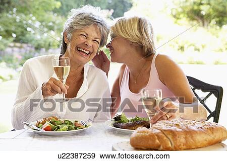 Friends Eating An Al Fresco Meal View Large Photo Image Stock Photo - Friends Eating An Al Fresco Meal. Fotosearch