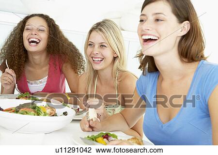 Friends Having Lunch Together At Home View Large Photo Image Stock Image - Friends Having Lunch Together At Home. Fotosearch