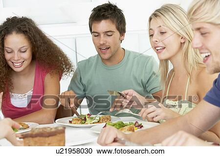 Friends Having Lunch Together At Home View Large Photo Image Stock Image - Friends Having Lunch Together At Home. Fotosearch
